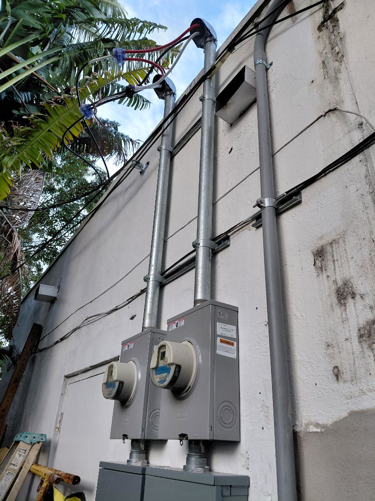 CarFix — Service Upgrade Mast & New Meter Cans Installed