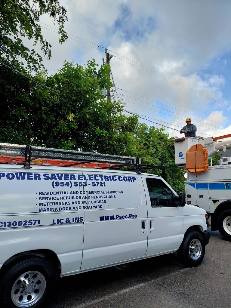 FPL Utility Coordination — Power Saver Electric Corp Van on Site with FPL Bucket Truck During Meter Bank Service Cutover