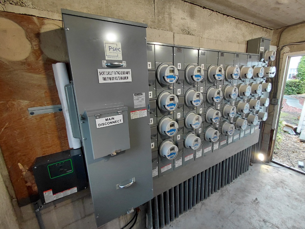 Completed Meter Bank — PSEC Labeled, Numbered, Main Disconnect, Fully Permitted and Inspected