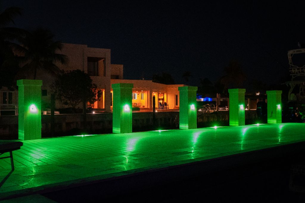RGBW Green — Full Dock & Piling System at Night