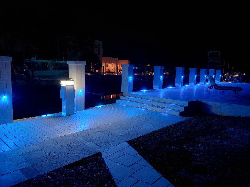 RGBW Blue — White Pillar Dock with Step Lighting at Night